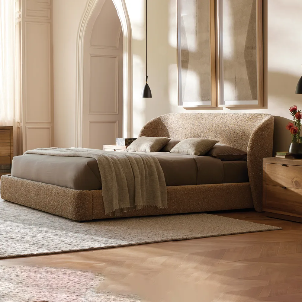 Bed frame includes space to accommodate variances in mattress sizes and to allow bedding to be tucked in.