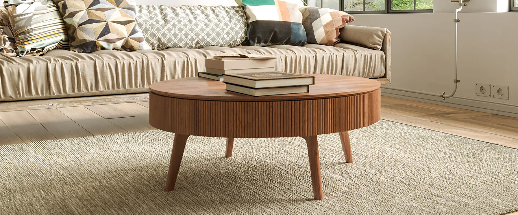 A modern round coffee table with a smooth wooden top and solid wooden legs, suitable for various interior styles