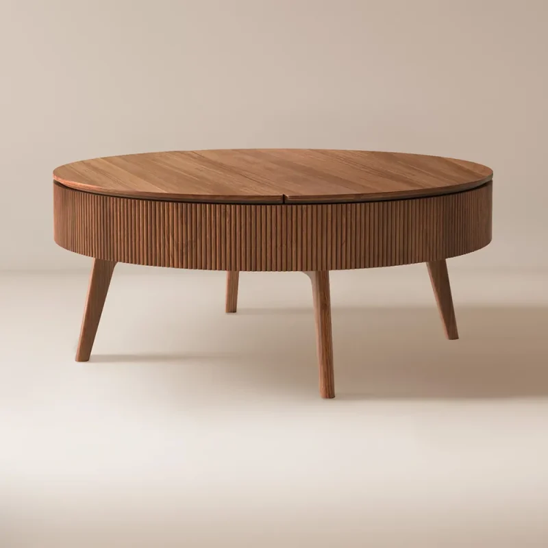 A round coffee table featuring a wooden top supported by sturdy wooden legs, ideal for any living space