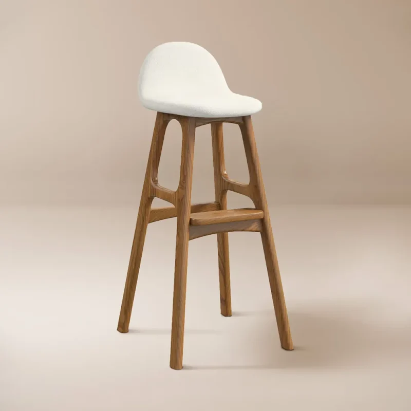A contemporary green bar stool supported by a wooden frame, ideal for adding a pop of color to dining or entertainment spaces