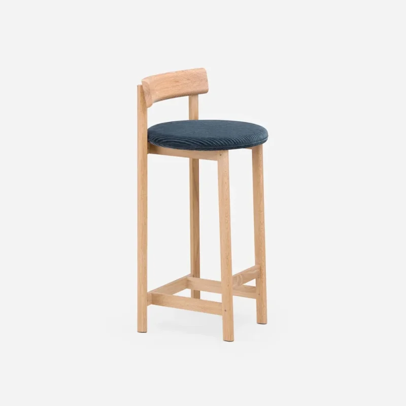 A wooden stool featuring a blue seat, combining comfort and style in a simple design