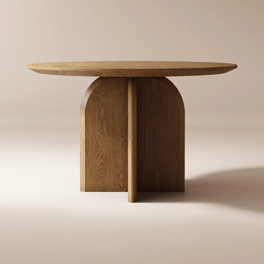 A round wooden dining table, showcasing a natural finish and elegant design, perfect for family gatherings and meals