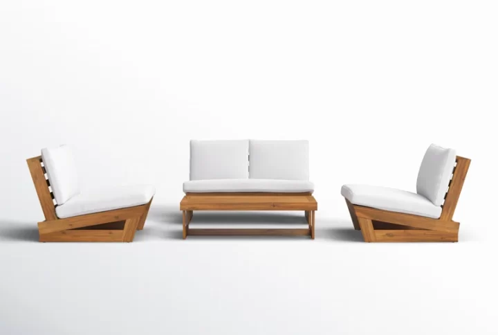 A wooden outdoor furniture set featuring white cushions, perfect for comfortable outdoor seating and relaxatio