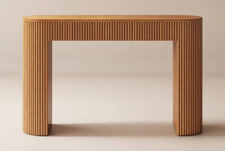 A wooden console table featuring a gracefully curved top, showcasing elegant craftsmanship and natural wood texture
