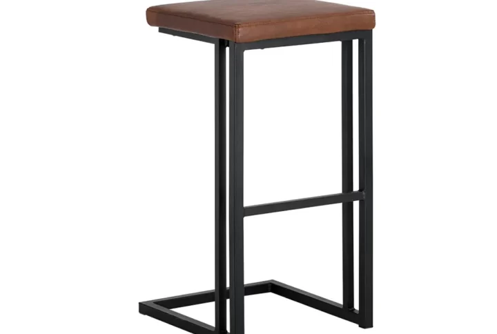 A white countertop paired with a wooden bar stool, creating a modern and inviting kitchen space