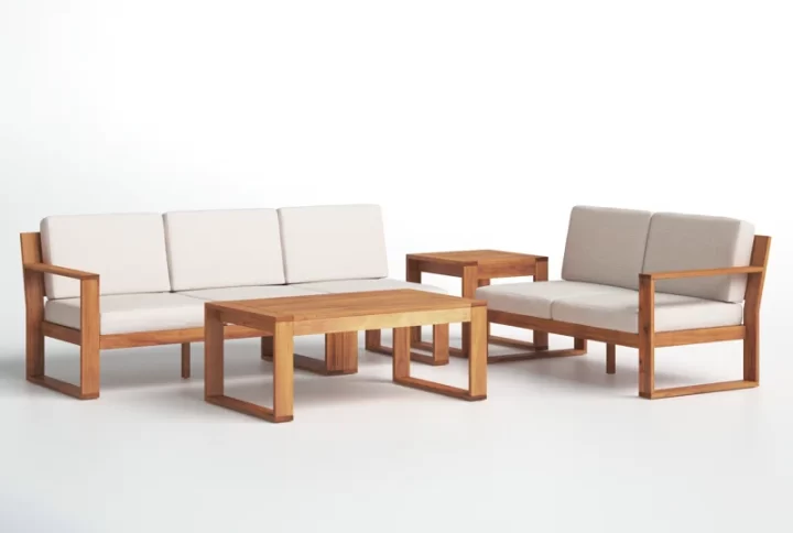 Get your backyard party-ready with this 4-piece conversation set. It's crafted from solid wood, and it comes with a sofa, armchair, side table, and coffee table. This set seats five people