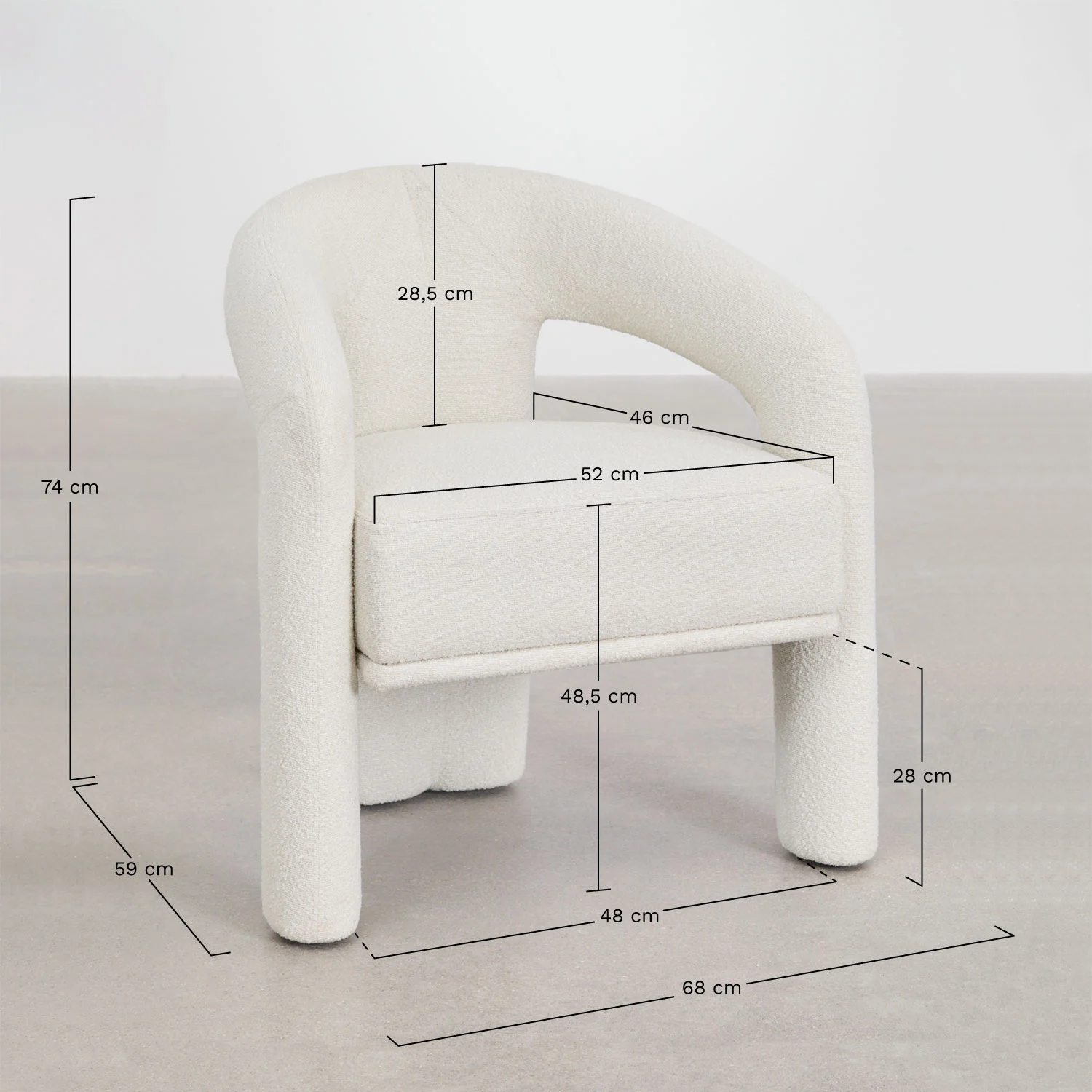 A chair and table arranged in a bright room with clean white walls, creating a serene atmosphere
