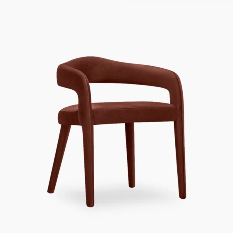 A dark brown velvet armchair, showcasing a luxurious and elegant design, perfect for any sophisticated interior.