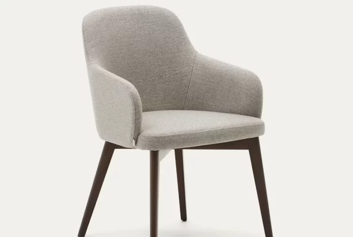 A grey upholstered dining chair featuring a sturdy wooden frame, designed for comfort and style