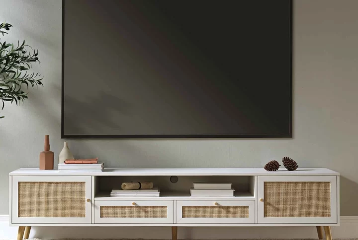 A sleek modern entertainment center featuring a large flat screen television, showcasing a contemporary design