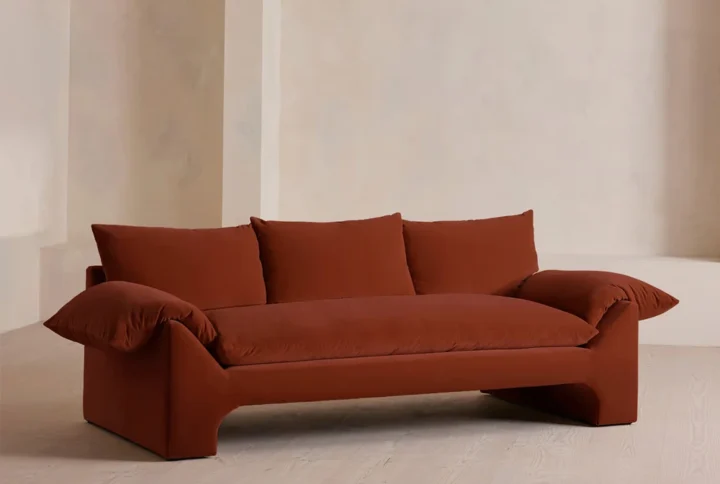 Urban Wyatt Three-Seater Velvet Sofa in rich brown upholstery with deep cushions and wide armrests