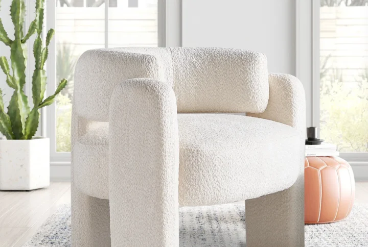 Avagrace Club Chair in bouclé fabric with three-leg design styled in modern living room