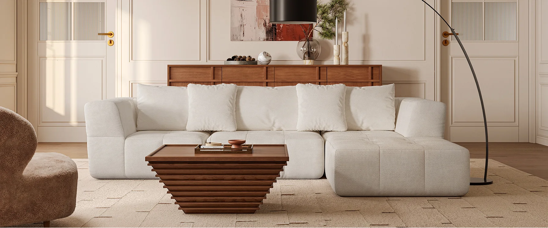 A bright living room scene highlighting a white couch and a wooden table, emphasizing a clean and contemporary aesthetic.