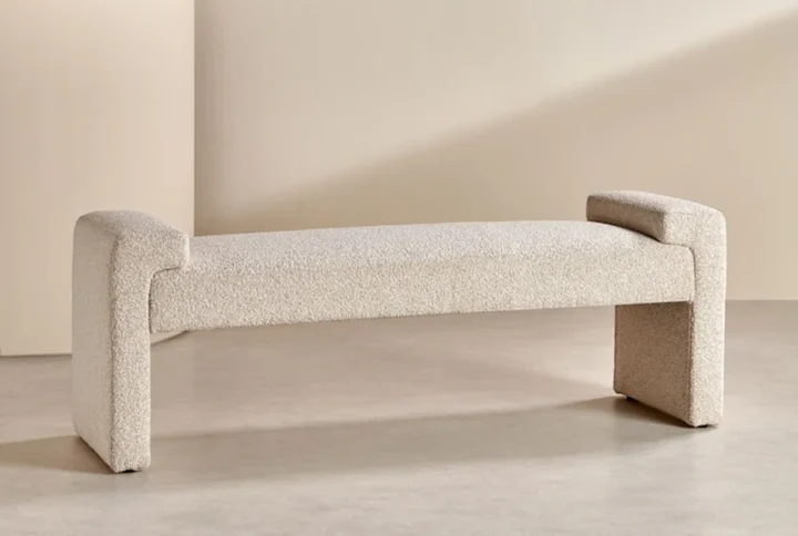 Brixton Bench with soft curved silhouette and textured fabric in a modern hallway setting.