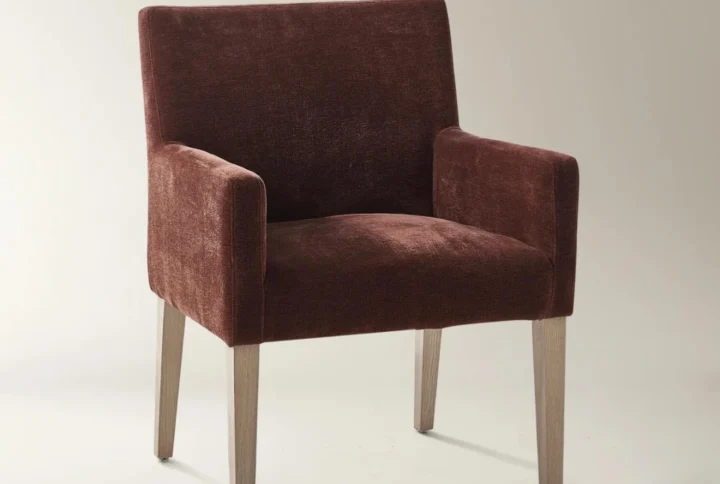 Stria Arm Chair in rust chenille with sculpted back and oak legs