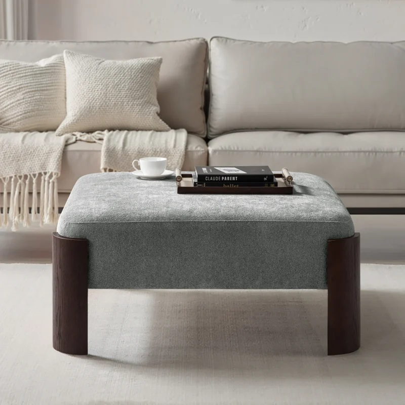 aurora modern round ottoman with plush chenille upholstery