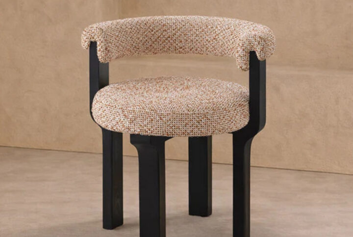 Elba Dining Chair featuring Dexter Sparkle Citrus linen-look fabric with matte black ash wood frame, showcasing a sculptural silhouette and supportive backrest