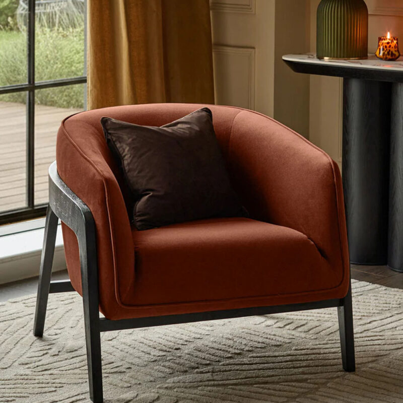 The Palmer Toffee Red Occasional Chair combines bold design wi