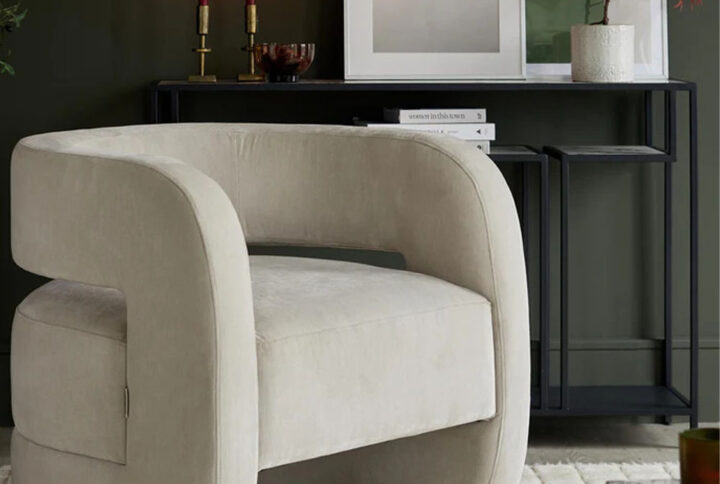 Silas Natural Grey Fabric Accent Chair front view in modern living room. Silas Accent Chair – elegant design in a contemporary setting.